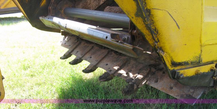 image for item 5046 1976 John Deere 762 paddle scraper