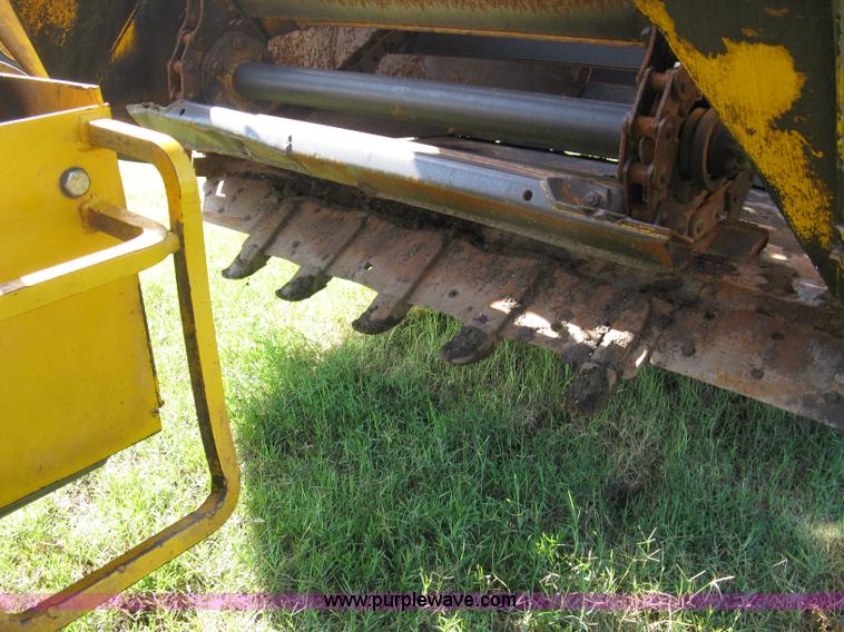 image for item 5046 1976 John Deere 762 paddle scraper