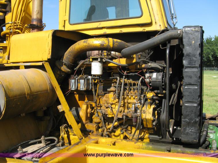 image for item 5046 1976 John Deere 762 paddle scraper