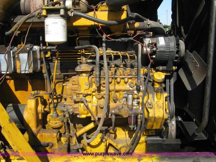 image for item 5046 1976 John Deere 762 paddle scraper