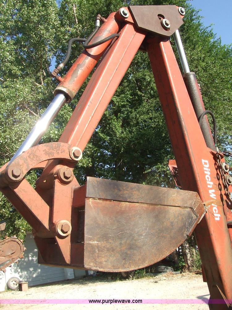 image for item 7123 1983 Ditch Witch 4010 trencher with backhoe