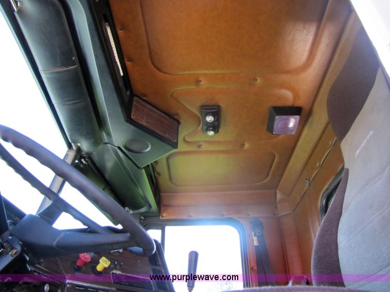 image for item 7239 1998 Freightliner Conventional FLD112 semi truck