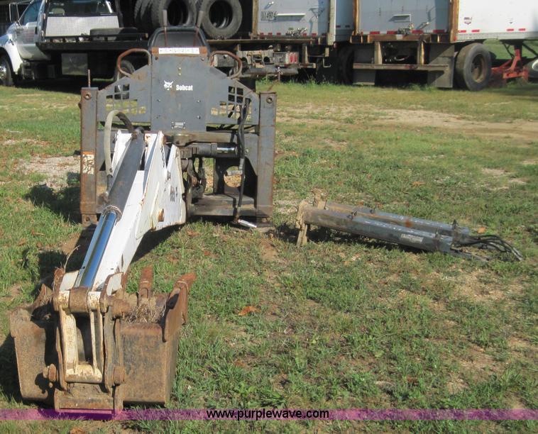 image for item 3027 Bobcat 709 back hoe skid steer attachment