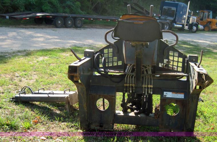 image for item 3027 Bobcat 709 back hoe skid steer attachment