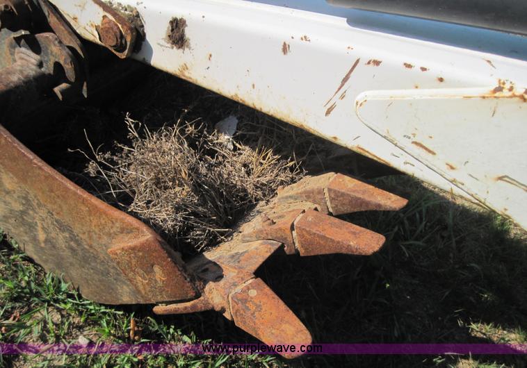 image for item 3027 Bobcat 709 back hoe skid steer attachment