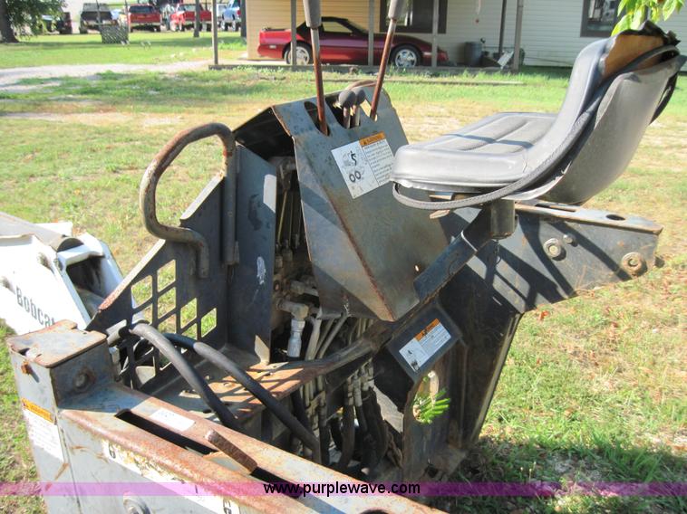image for item 3027 Bobcat 709 back hoe skid steer attachment