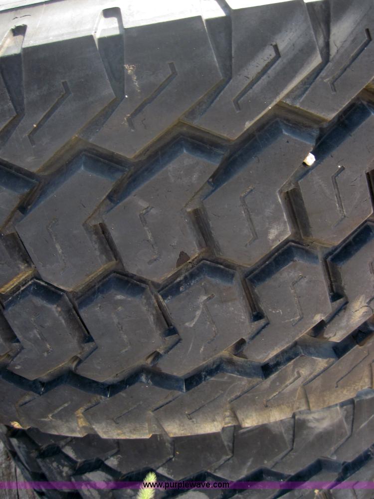 image for item 4465 (2) Michelin 445/65R19.5 tires on 10 bolt rims