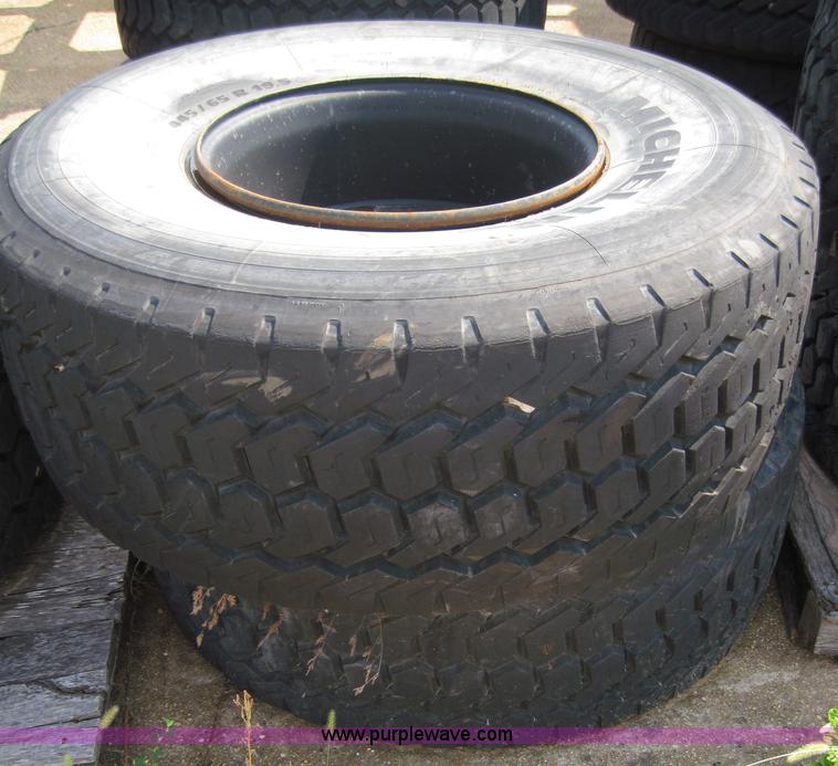 image for item 4466 (2) Michelin 445/65R19.5 tires on 10 bolt rims