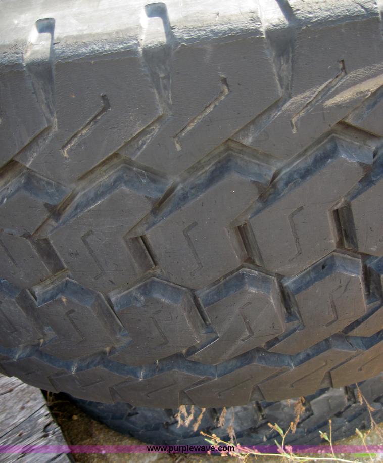 image for item 4466 (2) Michelin 445/65R19.5 tires on 10 bolt rims