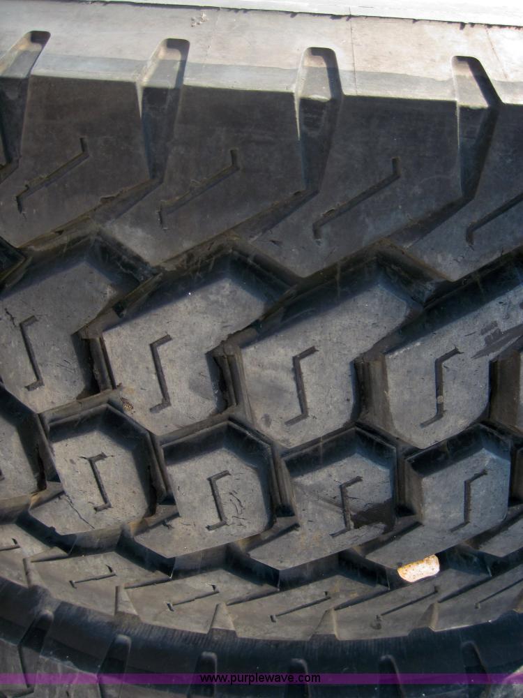 image for item 4468 (2) Michelin 445/65R19.5 tires on 10 bolt rims