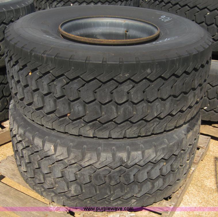 image for item 4469 (2) Michelin 445/65R19.5 tires on 10 bolt rims