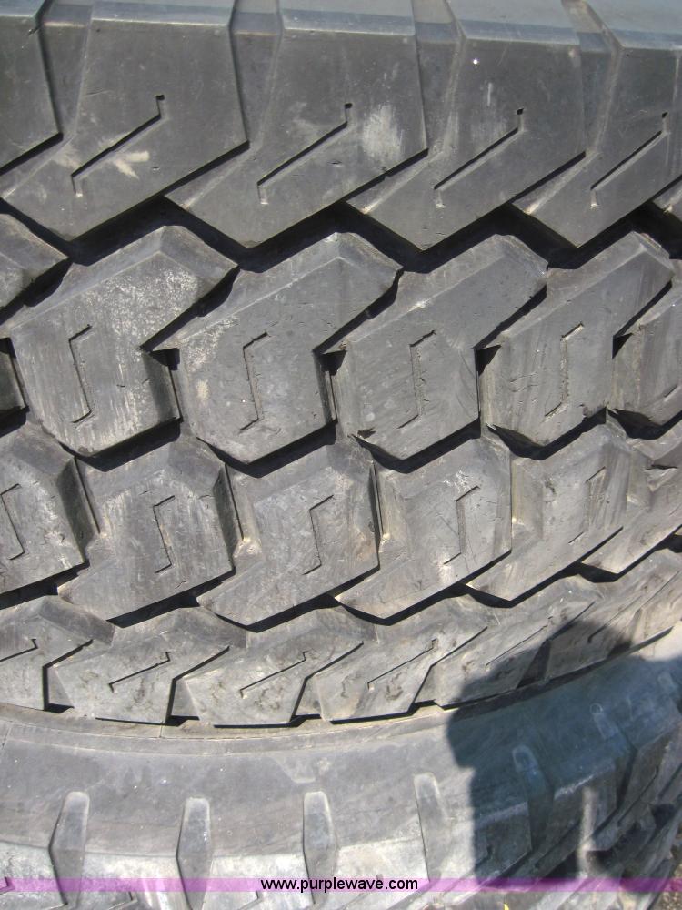 image for item 4469 (2) Michelin 445/65R19.5 tires on 10 bolt rims