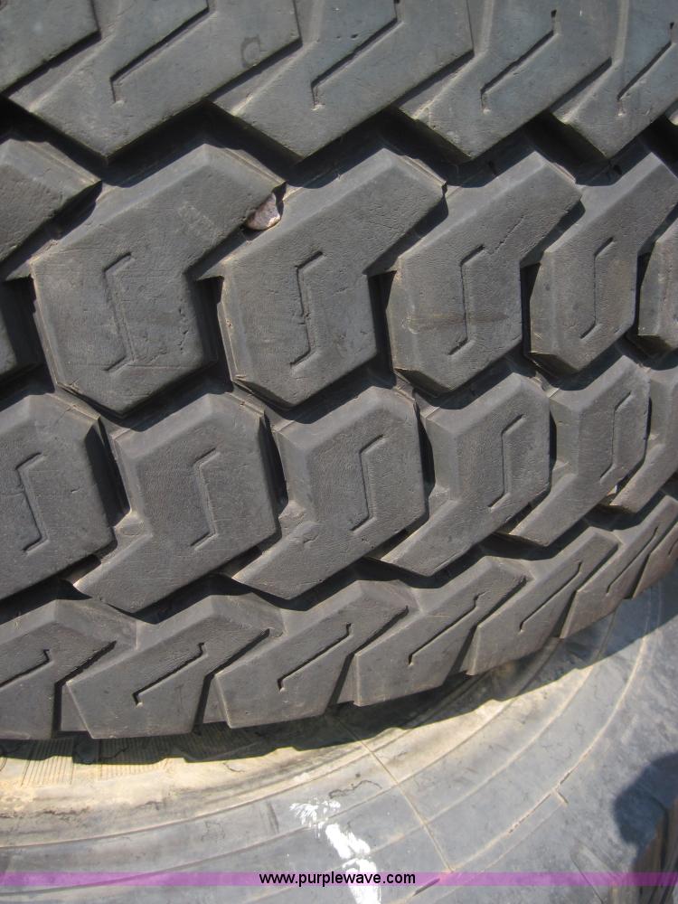 image for item 4470 (2) Michelin 445/65R19.5 tires on 10 bolt rims