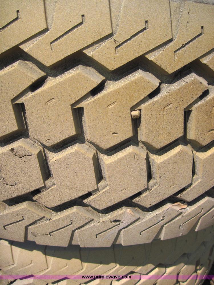 image for item 4473 (2) Michelin 445/65R19.5 tires on 10 bolt rims