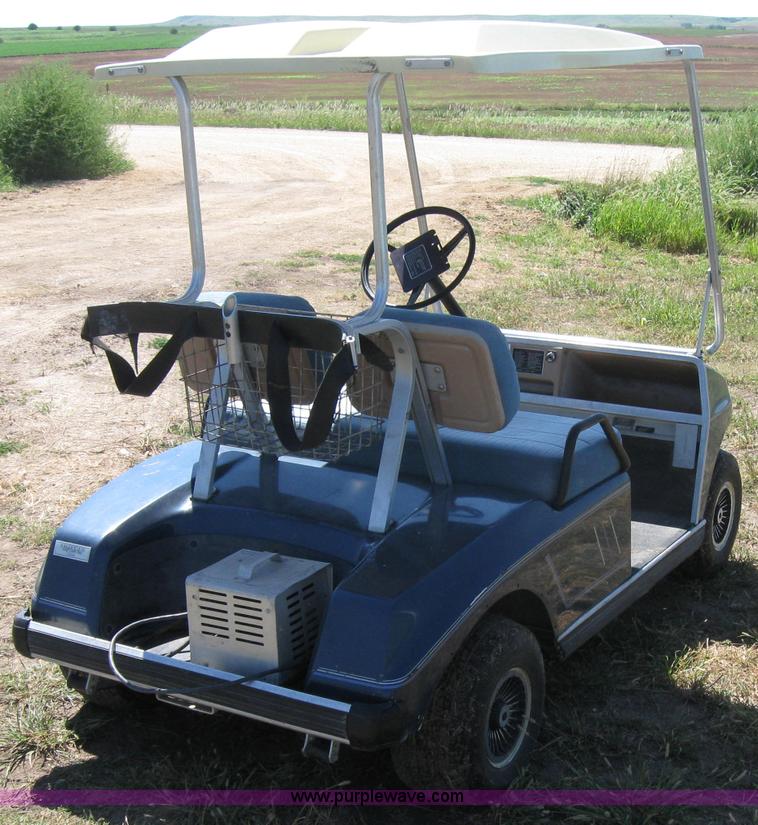 image for item 2656 Club Car golf cart with charger