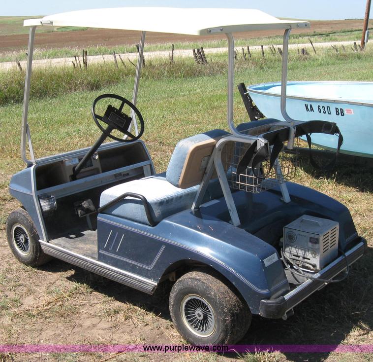 image for item 2656 Club Car golf cart with charger