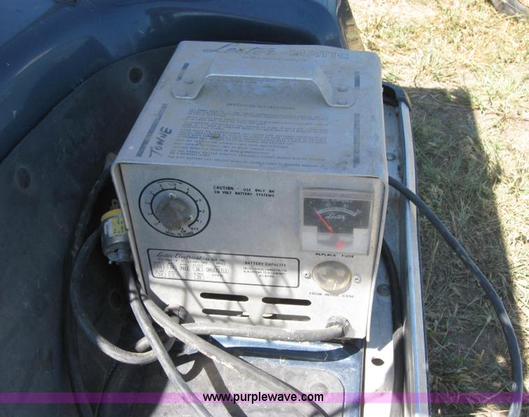 image for item 2656 Club Car golf cart with charger