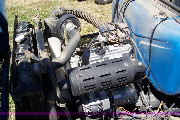 image for item 4122 1999 NH CM272 mower