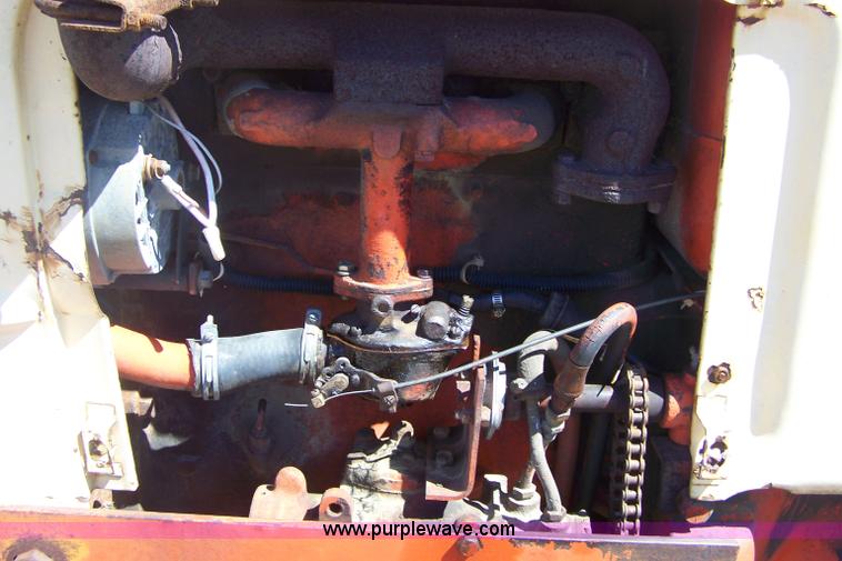 image for item 4126 Case 311 tractor with 5' rotary mower