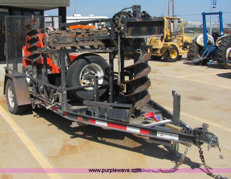 image for item 4828 2004 Powerhouse Pro mini skid-steer loader with attachments and customer trailer