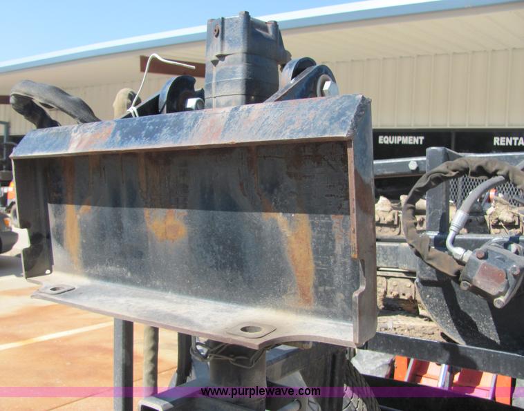 image for item 4828 2004 Powerhouse Pro mini skid-steer loader with attachments and customer trailer