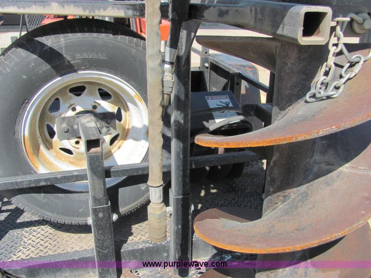 image for item 4828 2004 Powerhouse Pro mini skid-steer loader with attachments and customer trailer