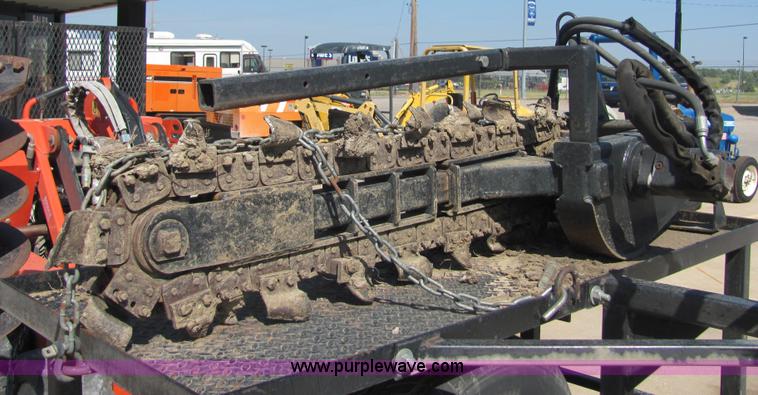 image for item 4828 2004 Powerhouse Pro mini skid-steer loader with attachments and customer trailer