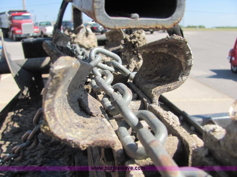 image for item 4828 2004 Powerhouse Pro mini skid-steer loader with attachments and customer trailer