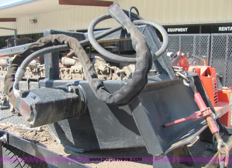 image for item 4828 2004 Powerhouse Pro mini skid-steer loader with attachments and customer trailer