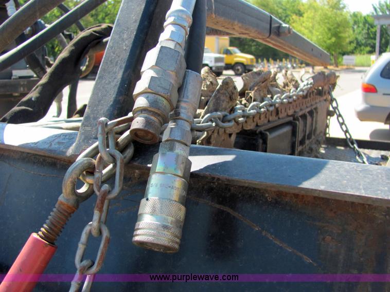 image for item 4828 2004 Powerhouse Pro mini skid-steer loader with attachments and customer trailer