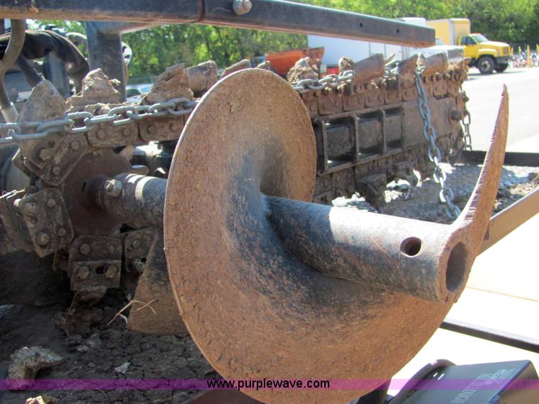 image for item 4828 2004 Powerhouse Pro mini skid-steer loader with attachments and customer trailer