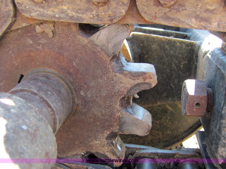 image for item 4828 2004 Powerhouse Pro mini skid-steer loader with attachments and customer trailer