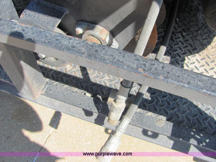 image for item 4828 2004 Powerhouse Pro mini skid-steer loader with attachments and customer trailer