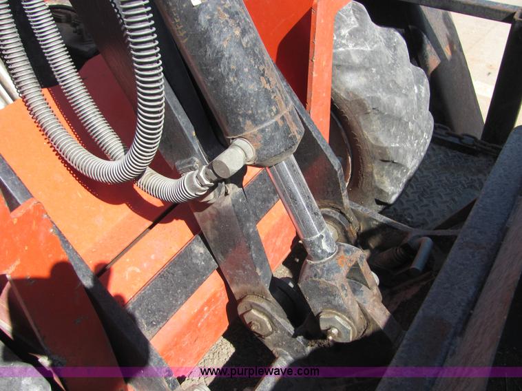 image for item 4828 2004 Powerhouse Pro mini skid-steer loader with attachments and customer trailer