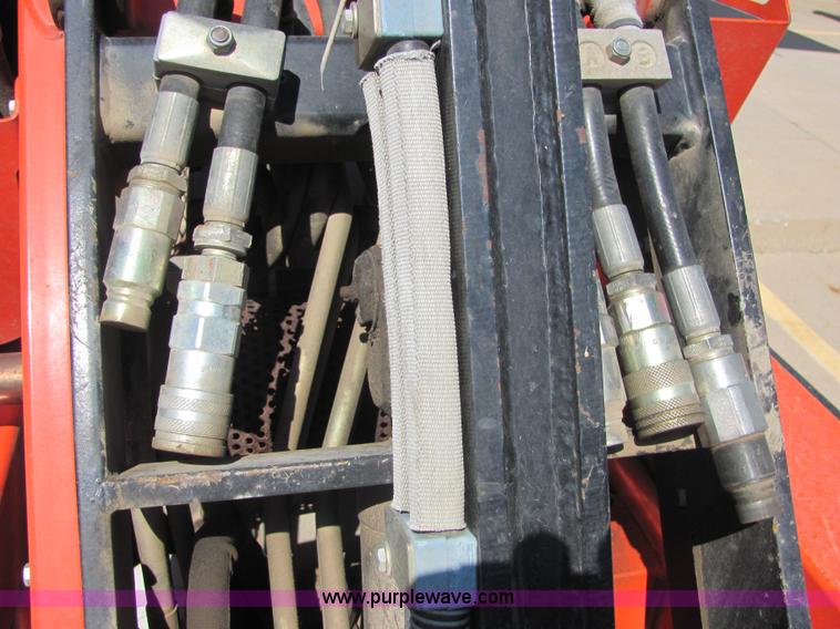 image for item 4828 2004 Powerhouse Pro mini skid-steer loader with attachments and customer trailer