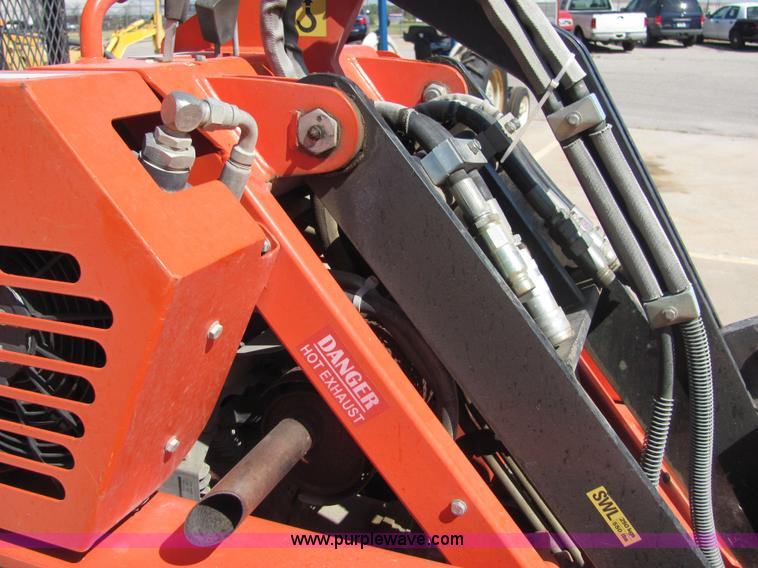 image for item 4828 2004 Powerhouse Pro mini skid-steer loader with attachments and customer trailer