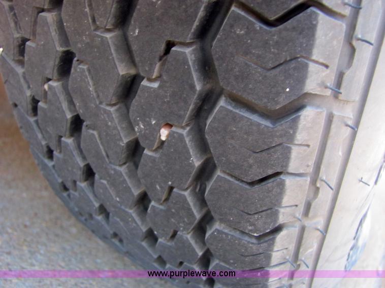 image for item 4828 2004 Powerhouse Pro mini skid-steer loader with attachments and customer trailer