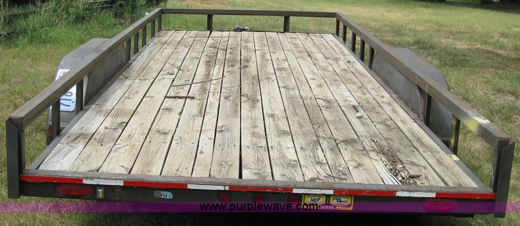 image for item 5063 2003 Load Trail tandem axle flat bed trailer