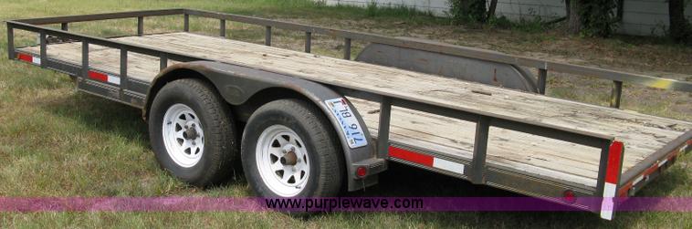 image for item 5063 2003 Load Trail tandem axle flat bed trailer