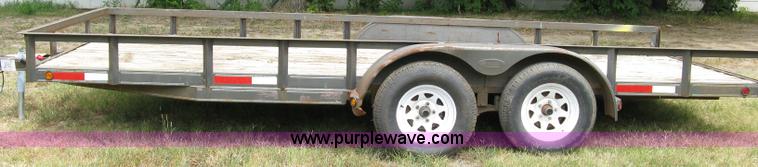 image for item 5063 2003 Load Trail tandem axle flat bed trailer