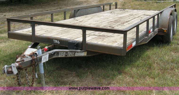 image for item 5063 2003 Load Trail tandem axle flat bed trailer