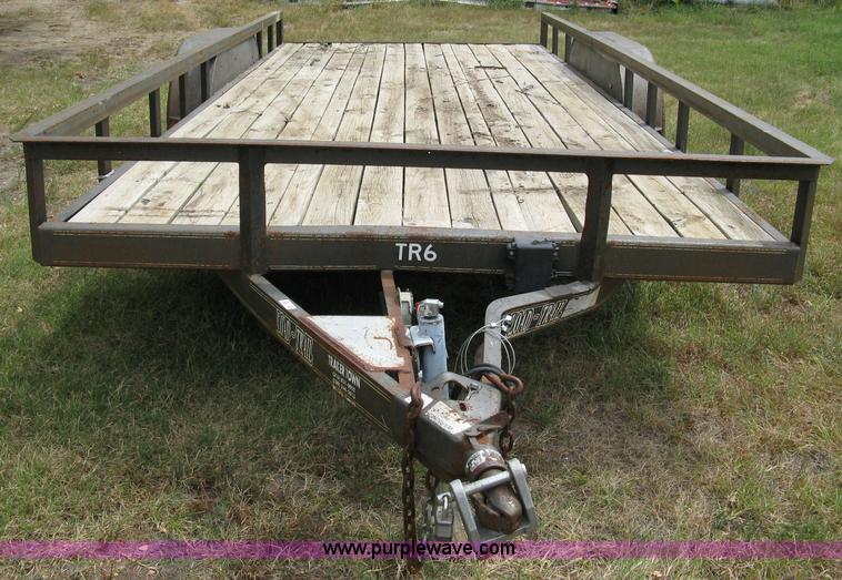 image for item 5063 2003 Load Trail tandem axle flat bed trailer