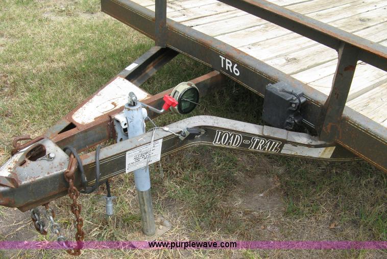 image for item 5063 2003 Load Trail tandem axle flat bed trailer