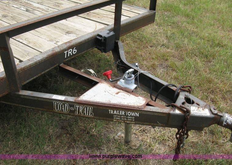 image for item 5063 2003 Load Trail tandem axle flat bed trailer