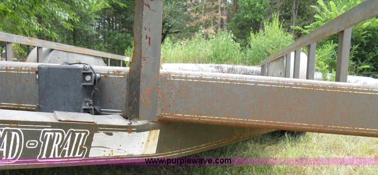 image for item 5063 2003 Load Trail tandem axle flat bed trailer