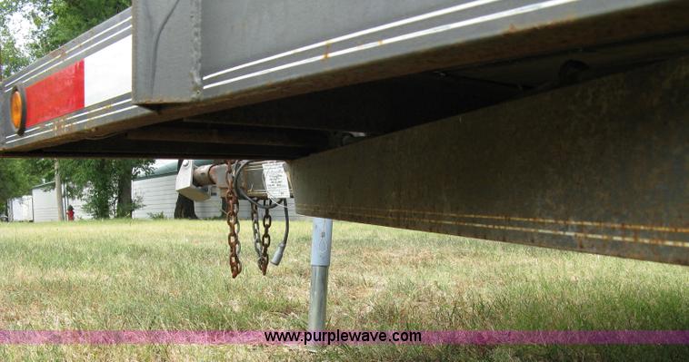 image for item 5063 2003 Load Trail tandem axle flat bed trailer