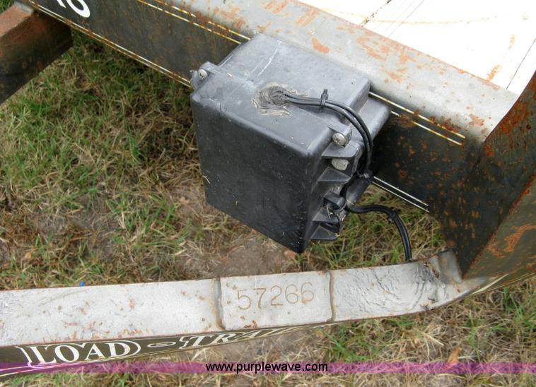 image for item 5063 2003 Load Trail tandem axle flat bed trailer