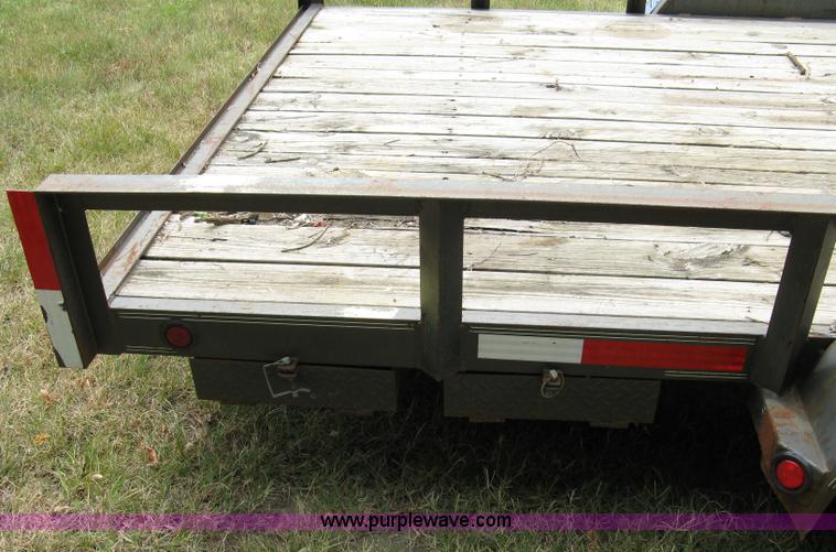 image for item 5063 2003 Load Trail tandem axle flat bed trailer