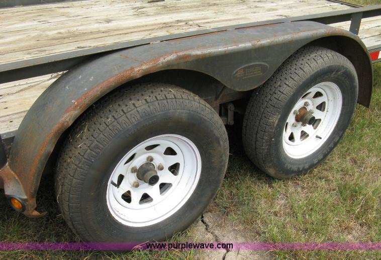 image for item 5063 2003 Load Trail tandem axle flat bed trailer
