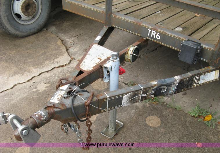 image for item 5063 2003 Load Trail tandem axle flat bed trailer